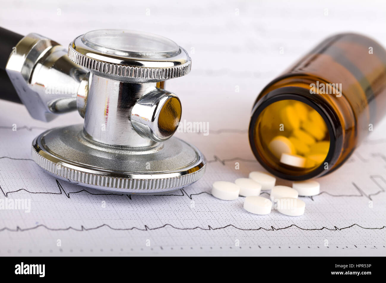 Picture of a whitel pills capsules and stethoscope Stock Photo