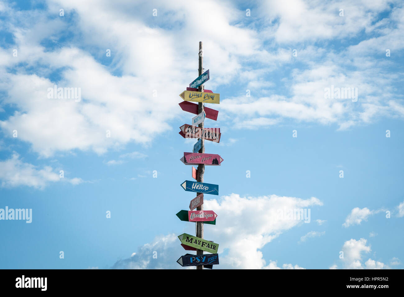 A Sign Post At Boomtown Festival, England, UK Stock Photo