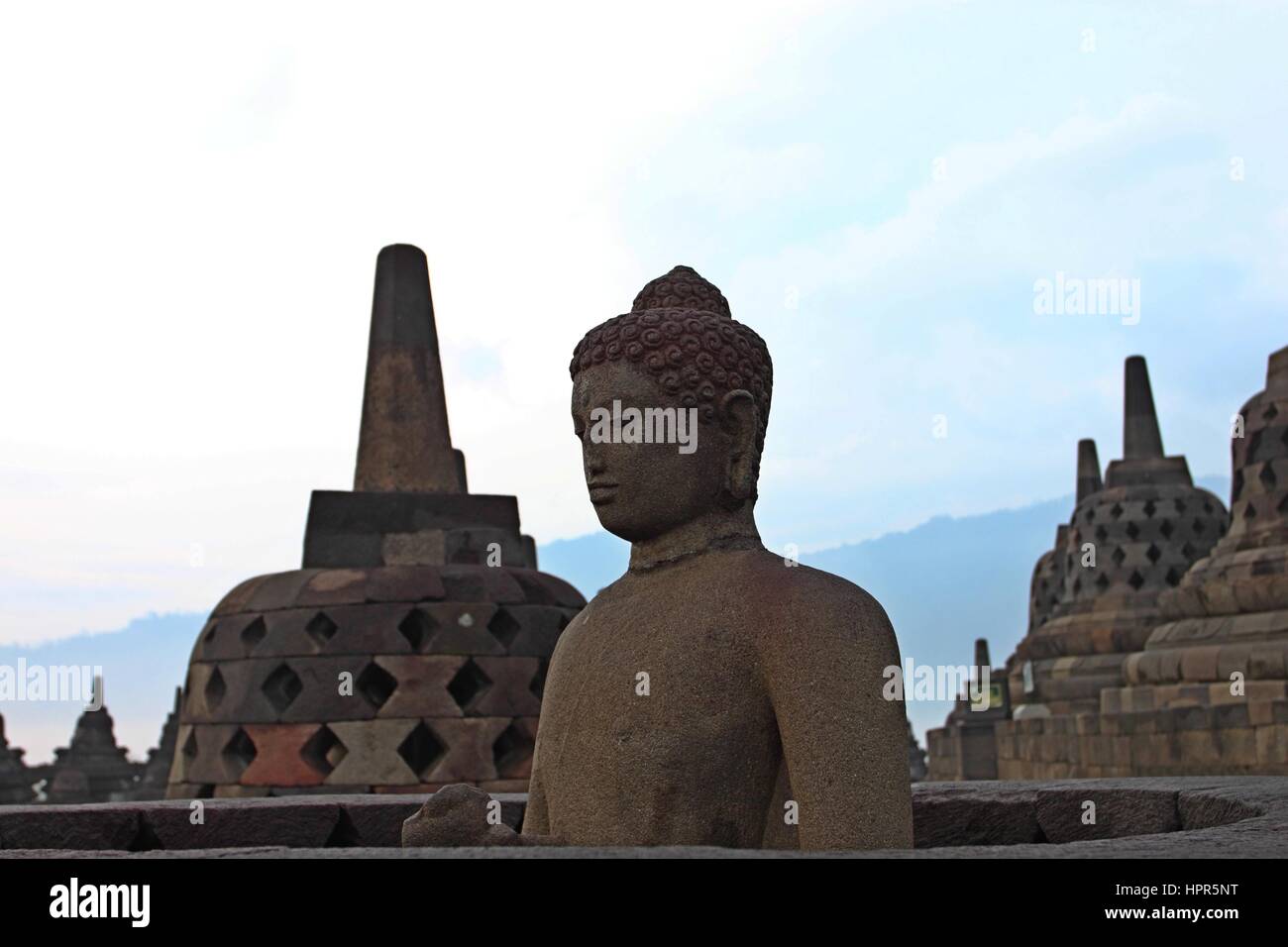 Buddha statue in stupa, Borobudur, near Yogyakarta, Java, Indonesia ...