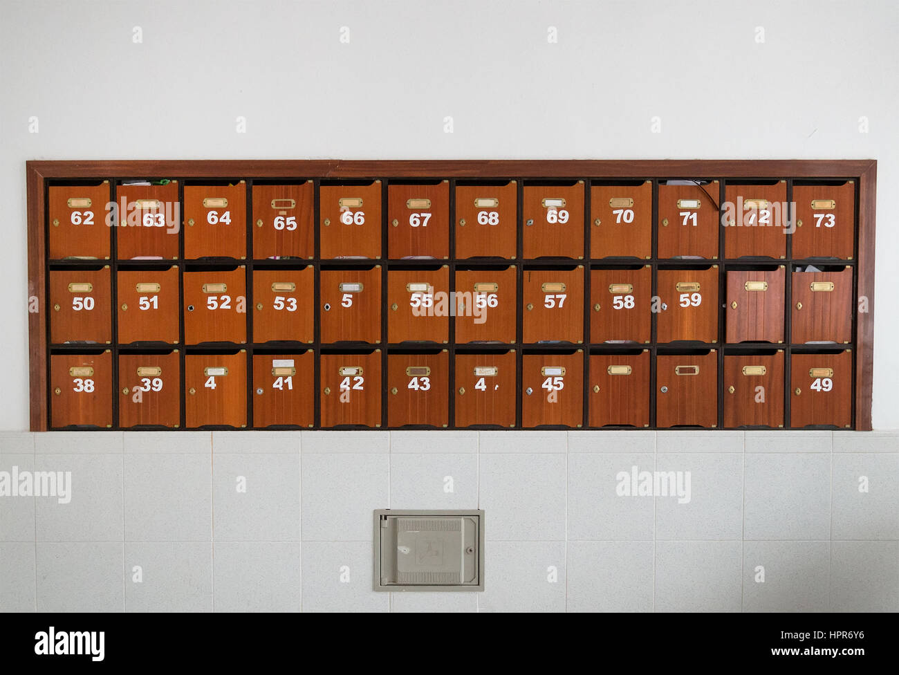Wooden mailboxes inside the house Stock Photo Alamy