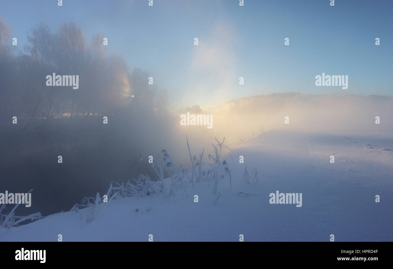 Misty frosty winter morning on a lake Stock Photo