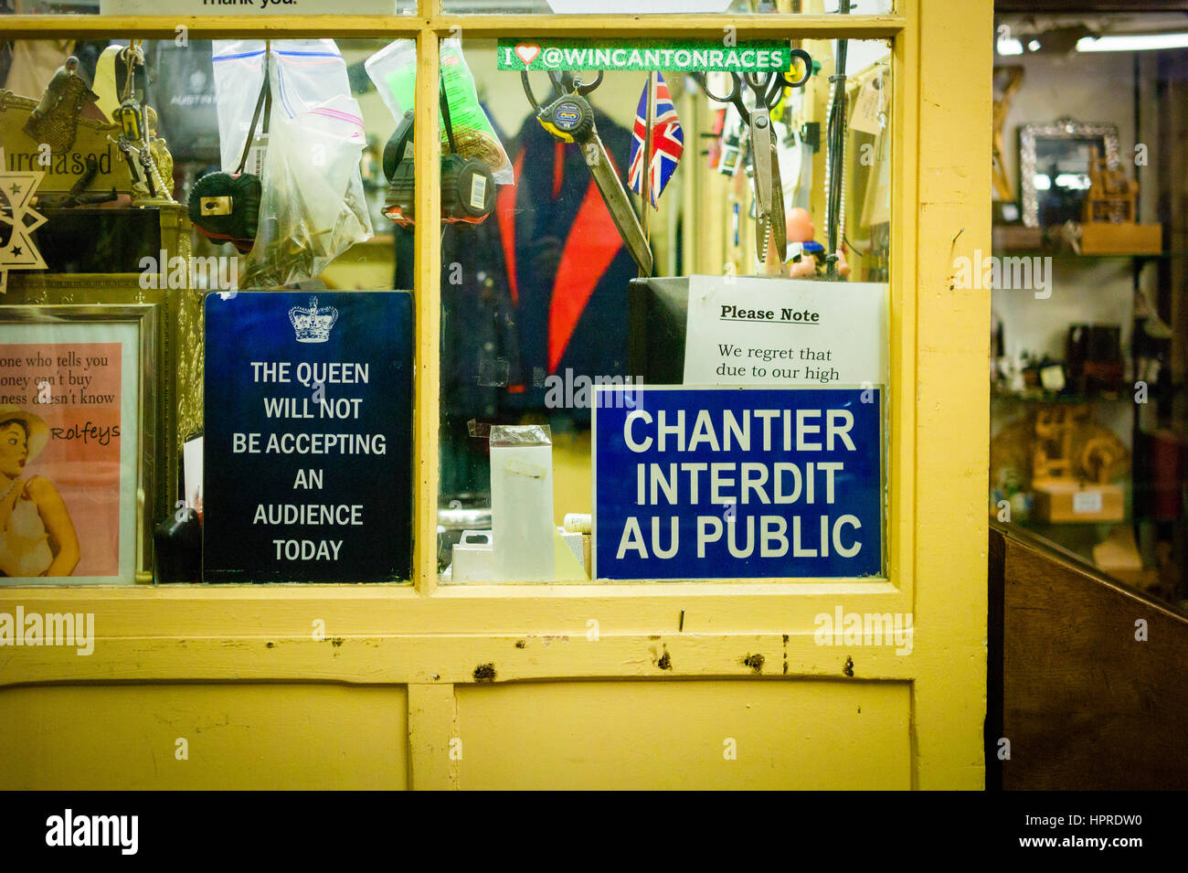 Inside an antiques store in Bath, Somerset, various signs adorn the