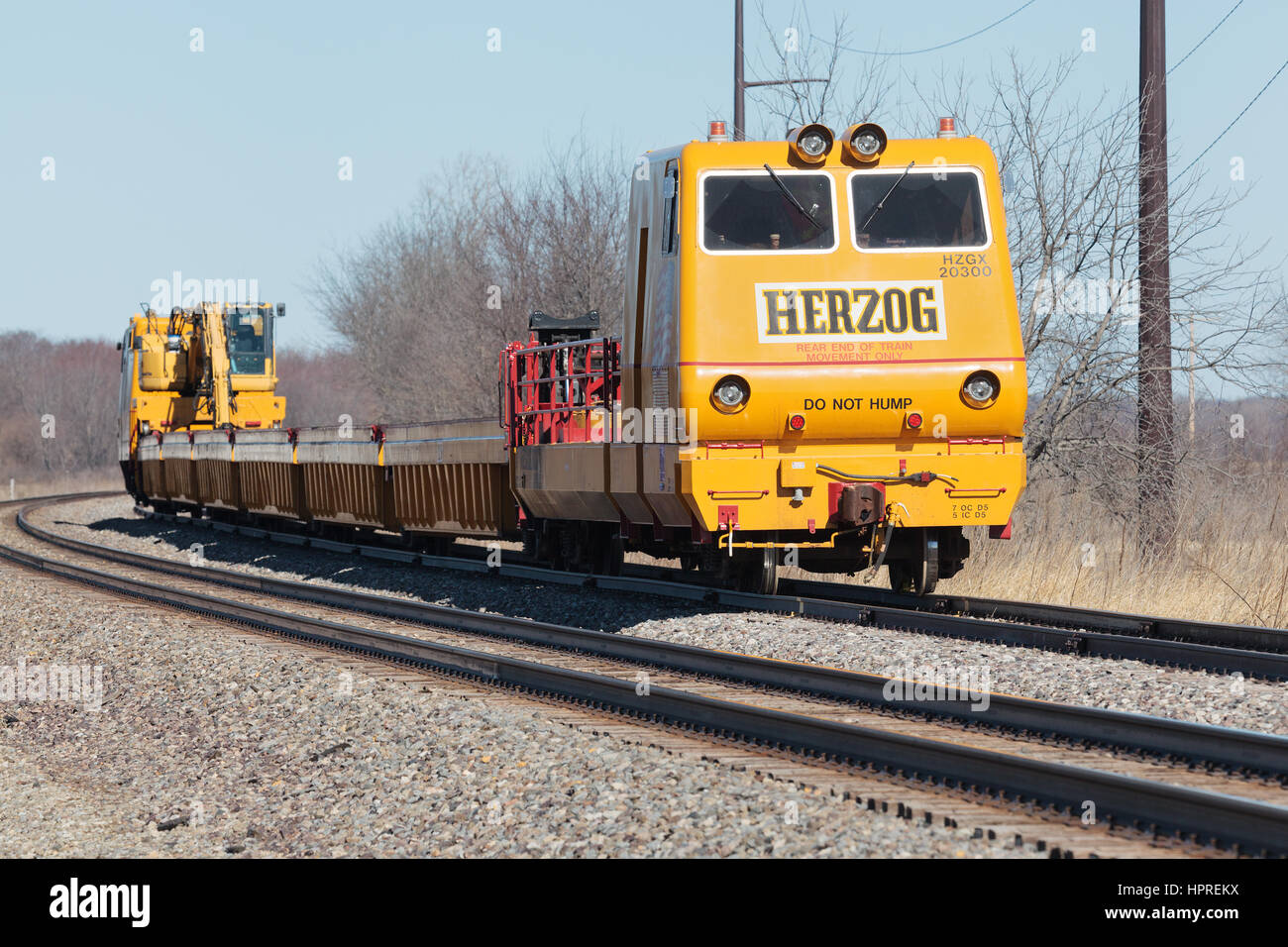 Herzog railroad equipment on a BNSF track in Wever, Iowa. Stock Photo