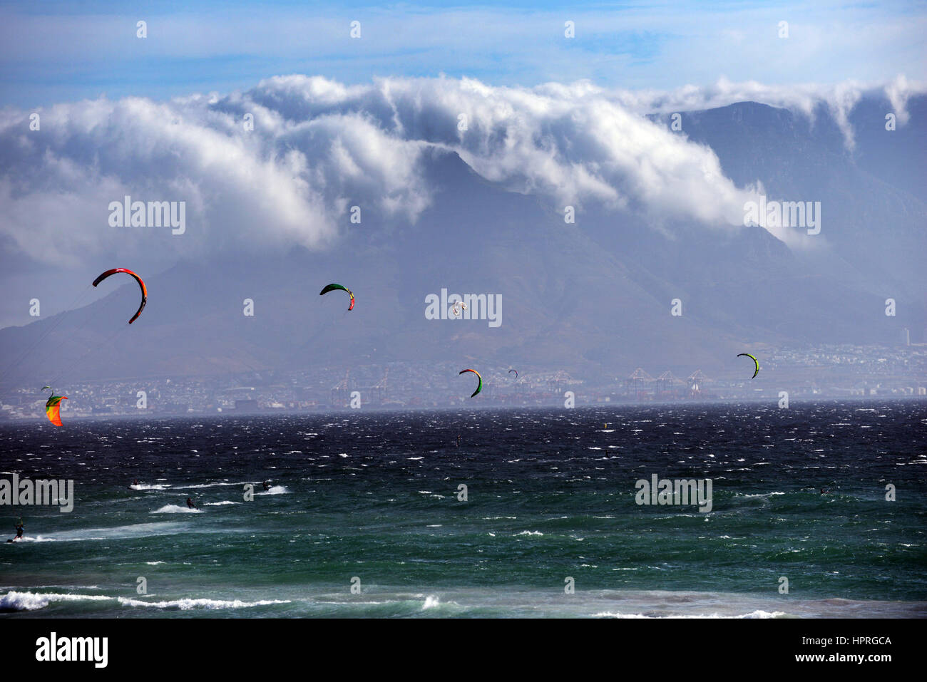 Kite surfing in Cape Town. The Table mountain is in the background. Stock Photo