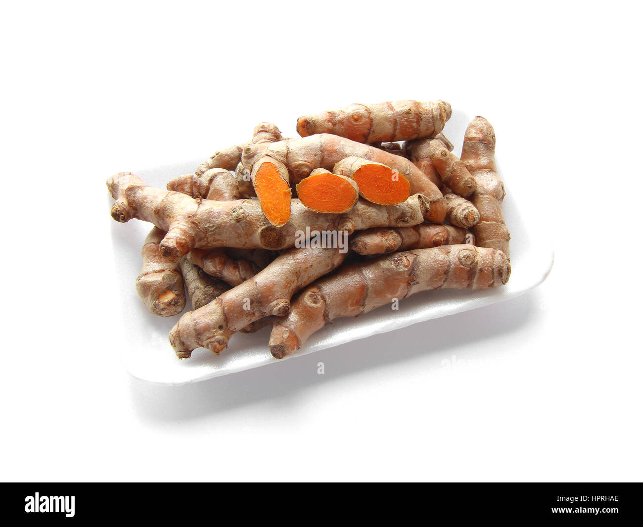 Turmeric or Turmeric Roots Isolated on white background Stock Photo