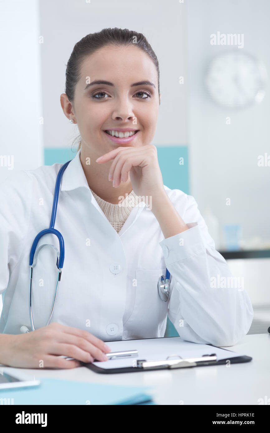 Beautiful young female doctor hi-res stock photography and images - Alamy