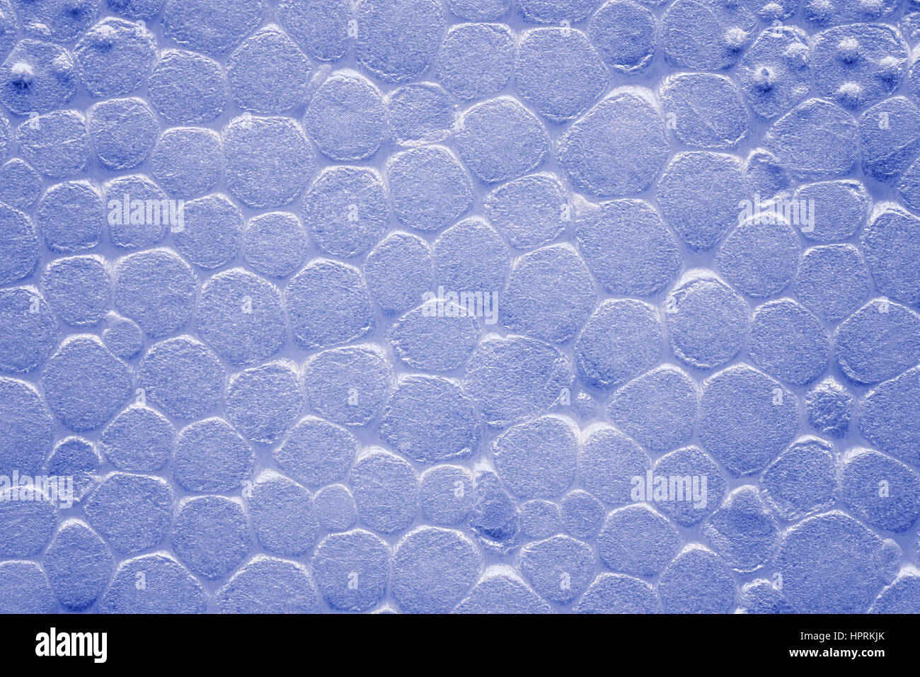 Color toned close up picture of white polystyrene foam, styrofoam texture background. Stock Photo