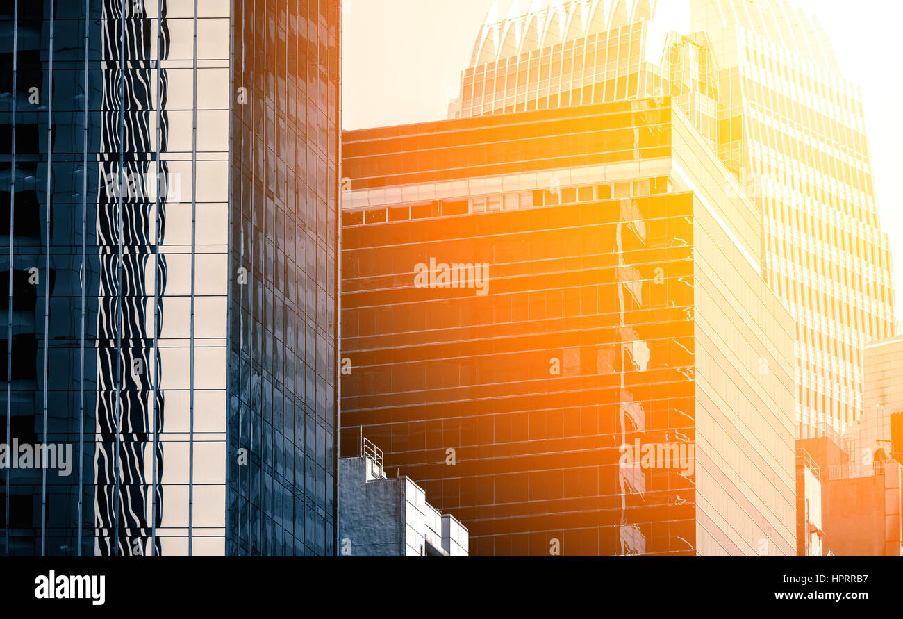 Modern office building close up in sunlight Stock Photo - Alamy
