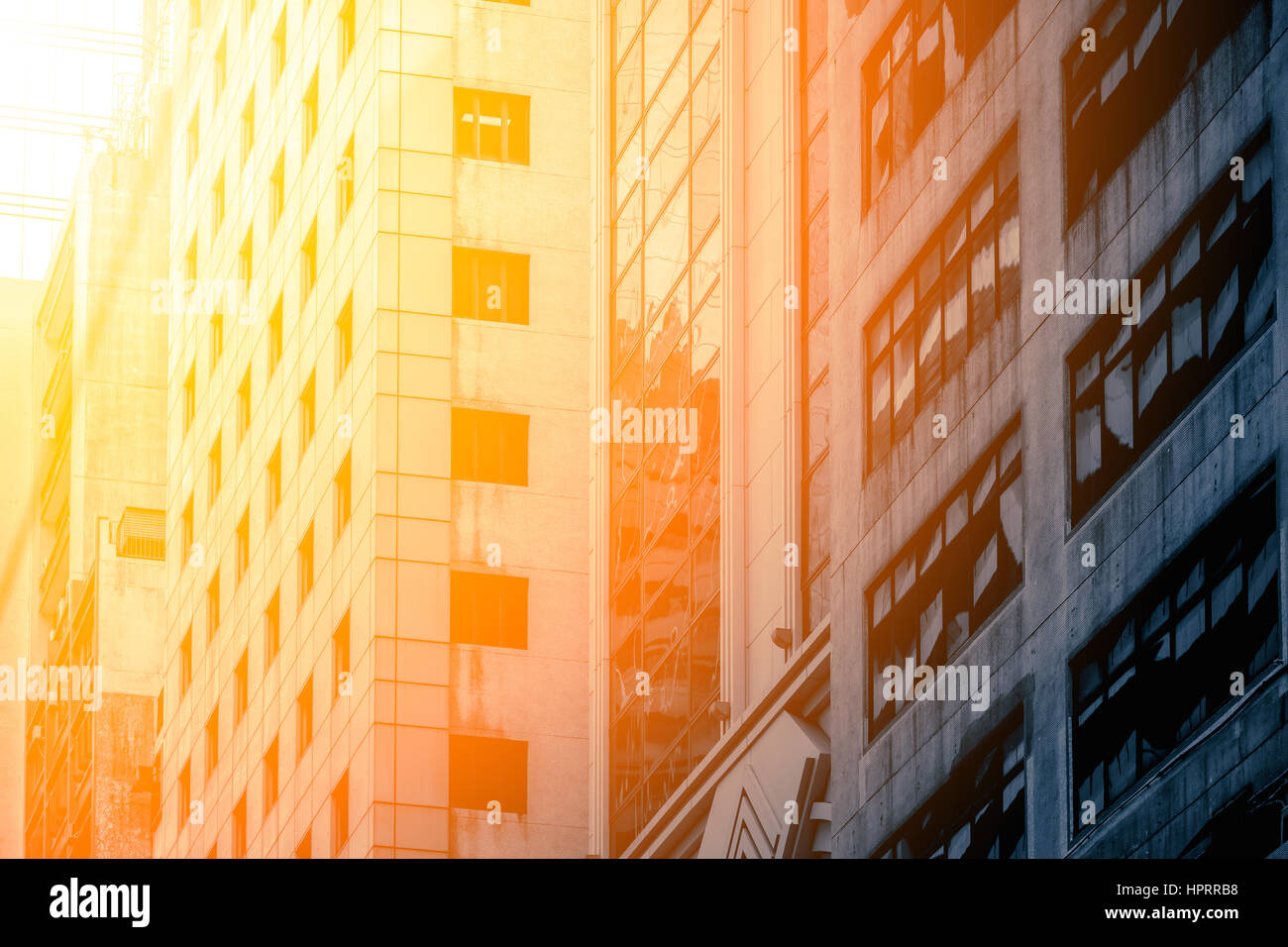 Modern office building close up in sunlight Stock Photo - Alamy