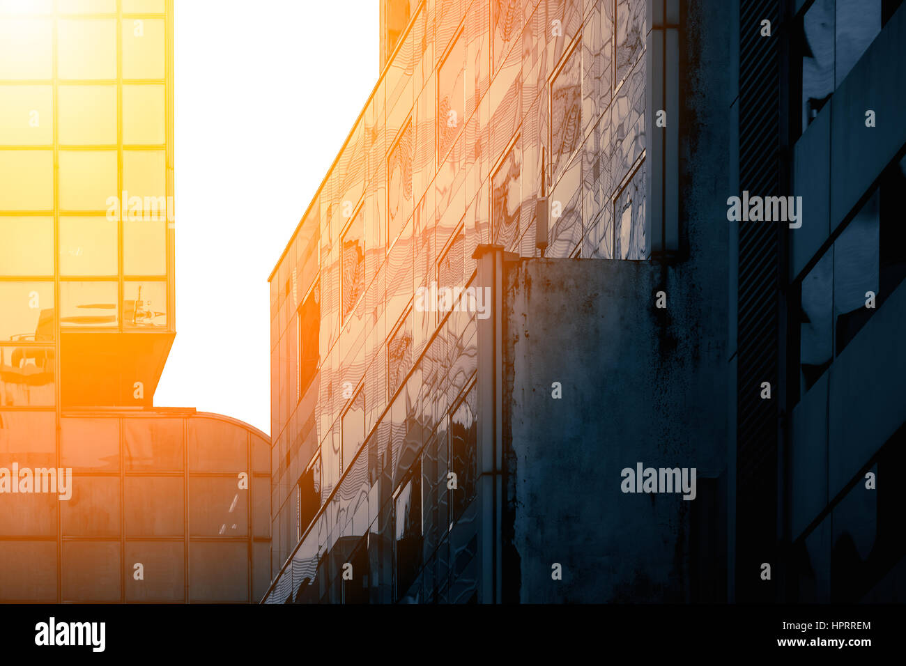 Modern office building close up in sunlight Stock Photo - Alamy