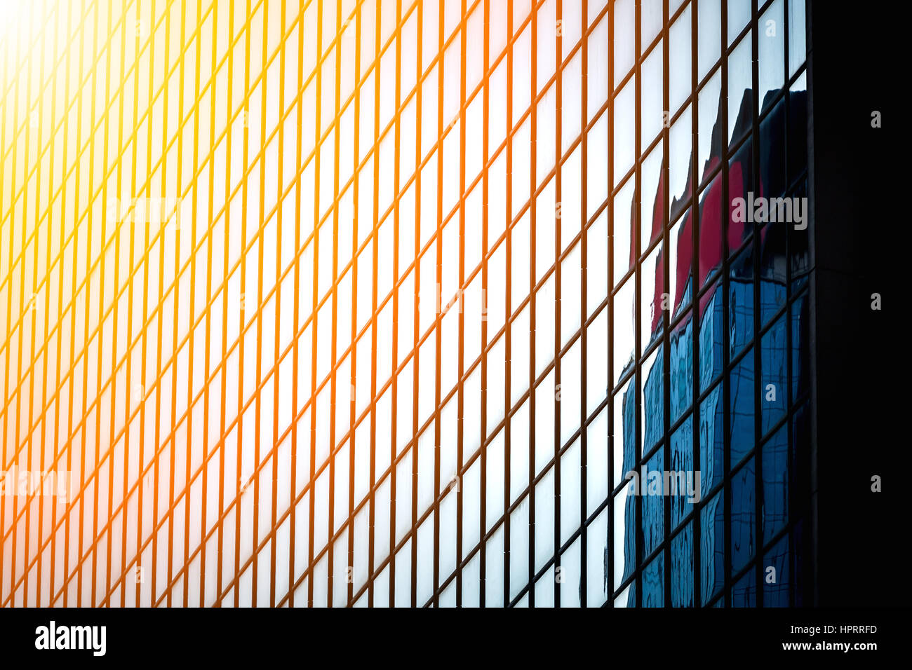 Modern office building close up in sunlight Stock Photo - Alamy