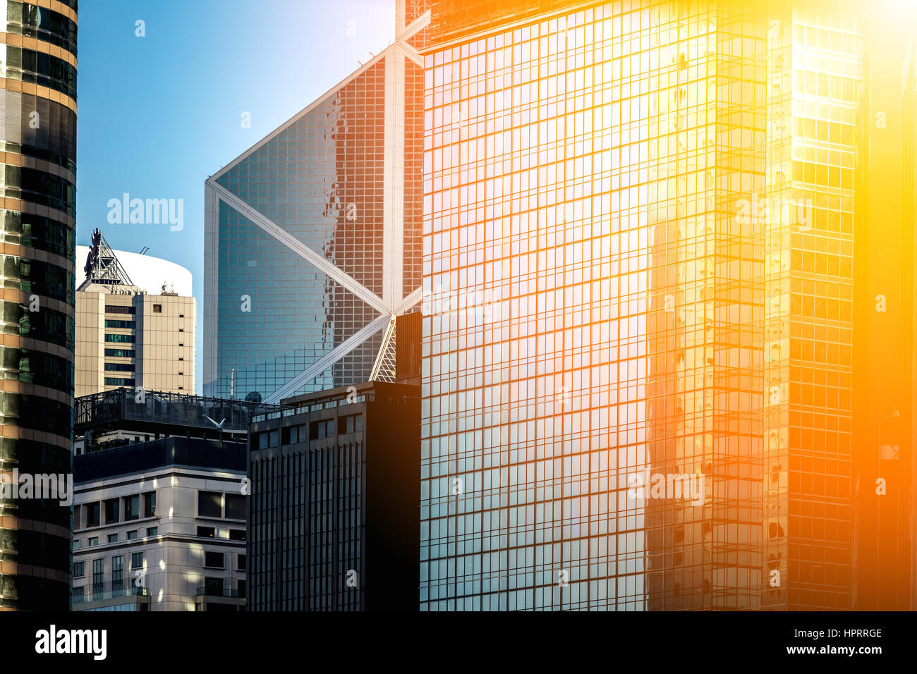 Modern office building close up in sunlight Stock Photo - Alamy