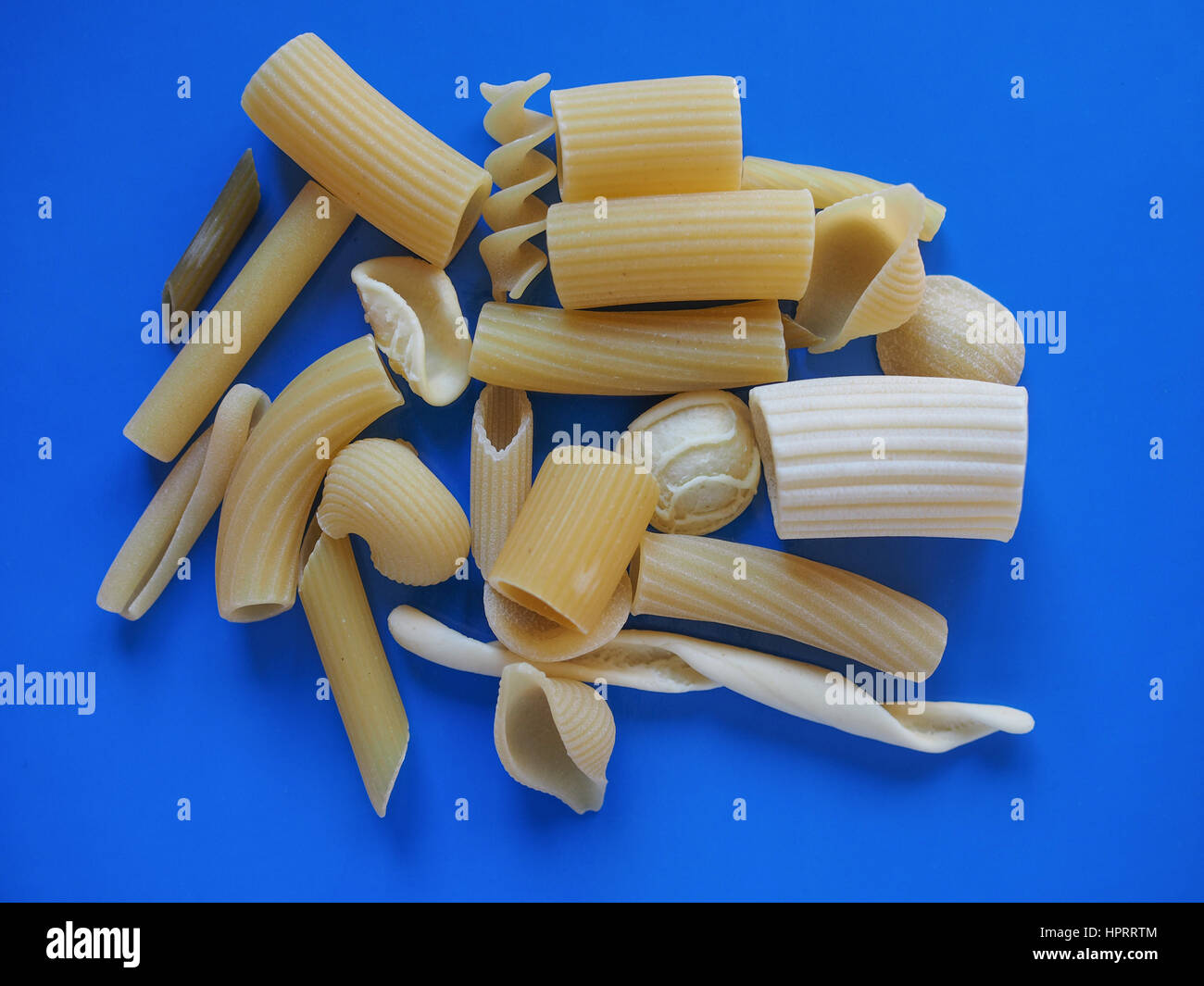 Many different types of Italian pasta including penne macaroni (maccheroni)  fusilli spaghetti trenette (linguine) orecchiette tortiglioni conchiglie  Stock Photo - Alamy