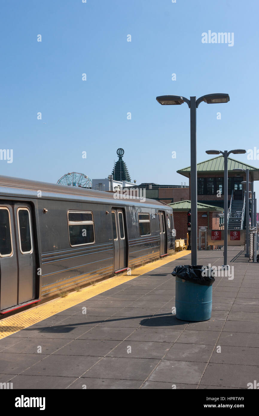 Q line train and platform on Coney Island subway station, Brooklyn, New