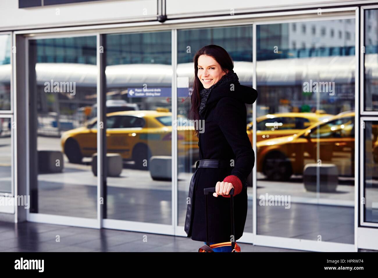 Young beautiful woman in airport hi-res stock photography and images ...