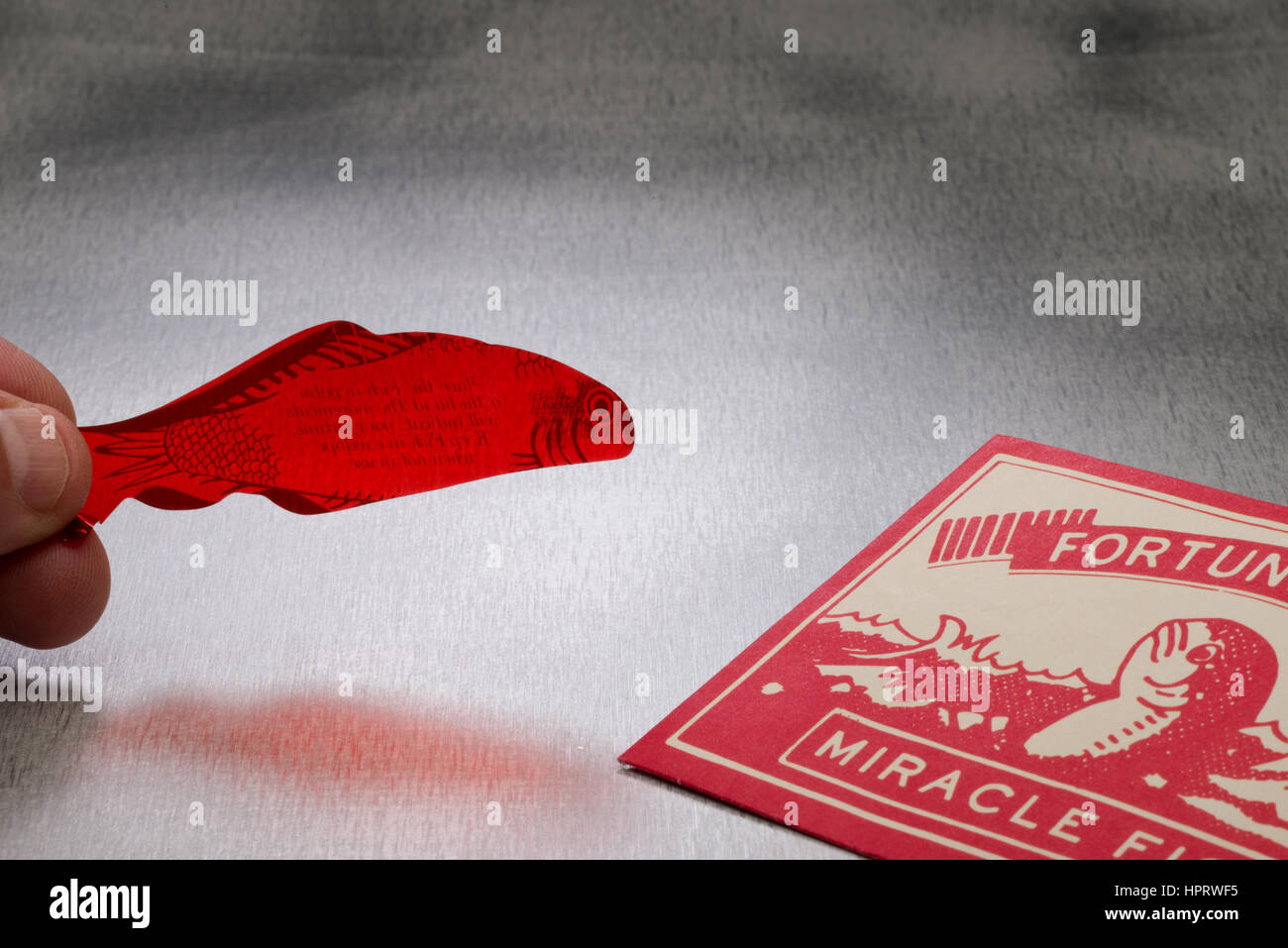 Fortune telling fish. Place on palm of hand and it will react in