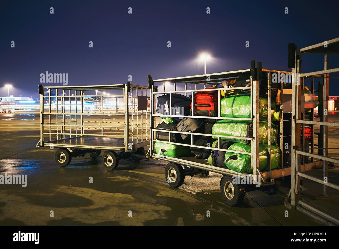 Carts with many baggage at the airport Stock Photo Alamy