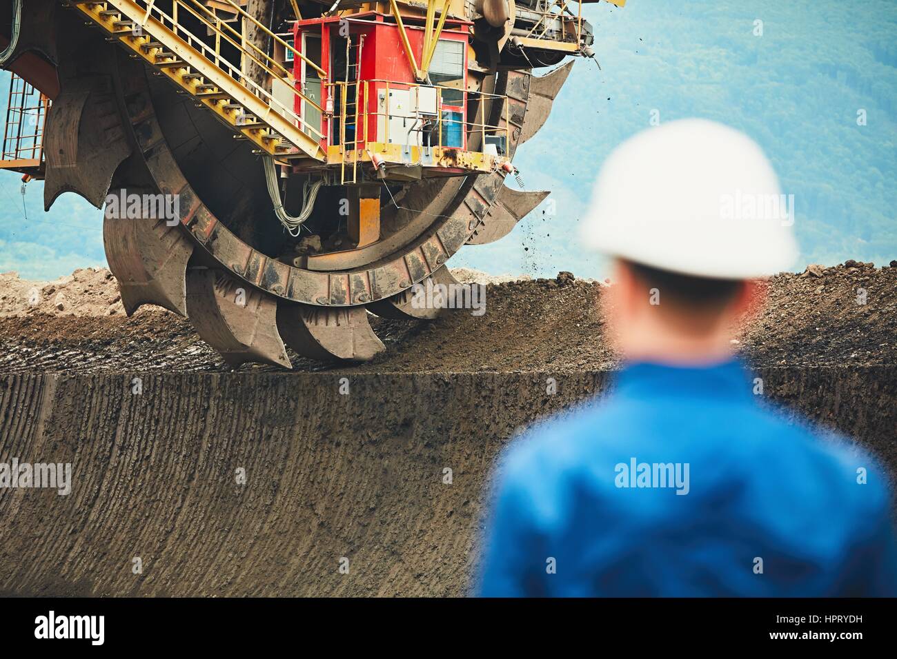 Coal mining in an open pit. Miner looking on the huge excavator. Industry in the Czech Republic, Europe Stock Photo - Alamy Coal mining in an open pit. Miner looking on the huge excavator. Industry in the Czech Republic, Europe Stock Photo - Alamy