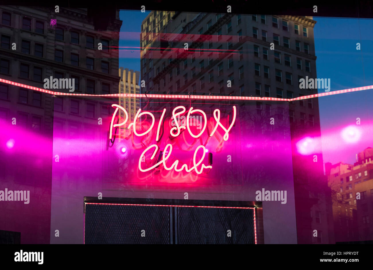 Poison Club neon sign in Macy's window Stock Photo