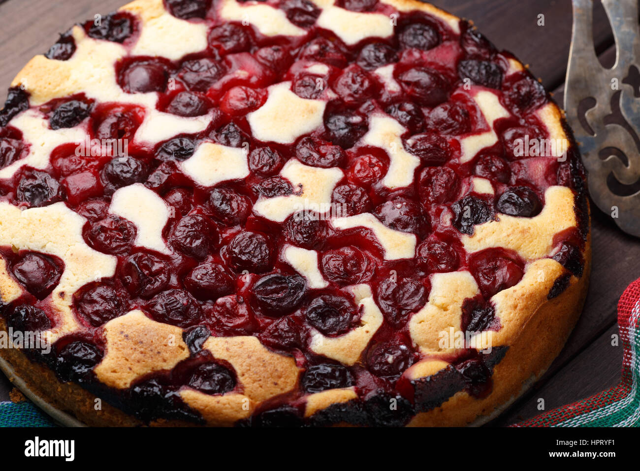 Homemade cherry pie on rustic background with vintage blade Stock Photo ...