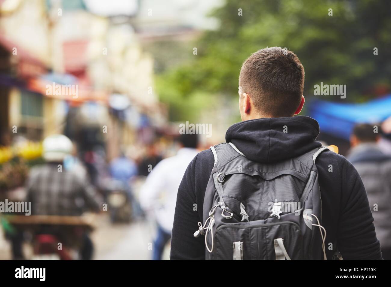 Young traveler with back pack - Hanoi, Vietnam Stock Photo
