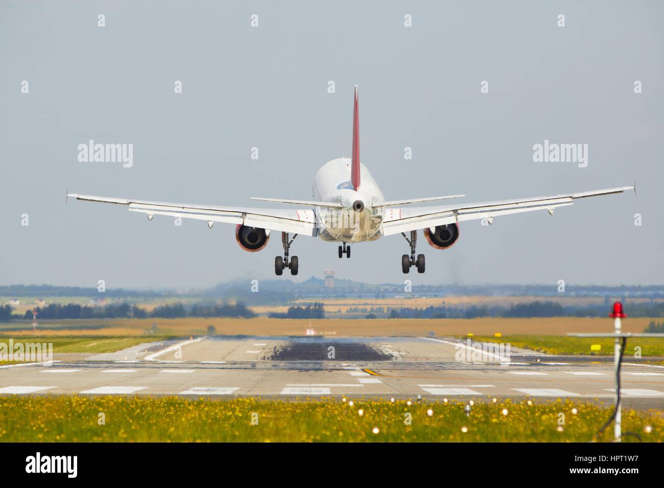 Blue plane landing hi-res stock photography and images - Alamy