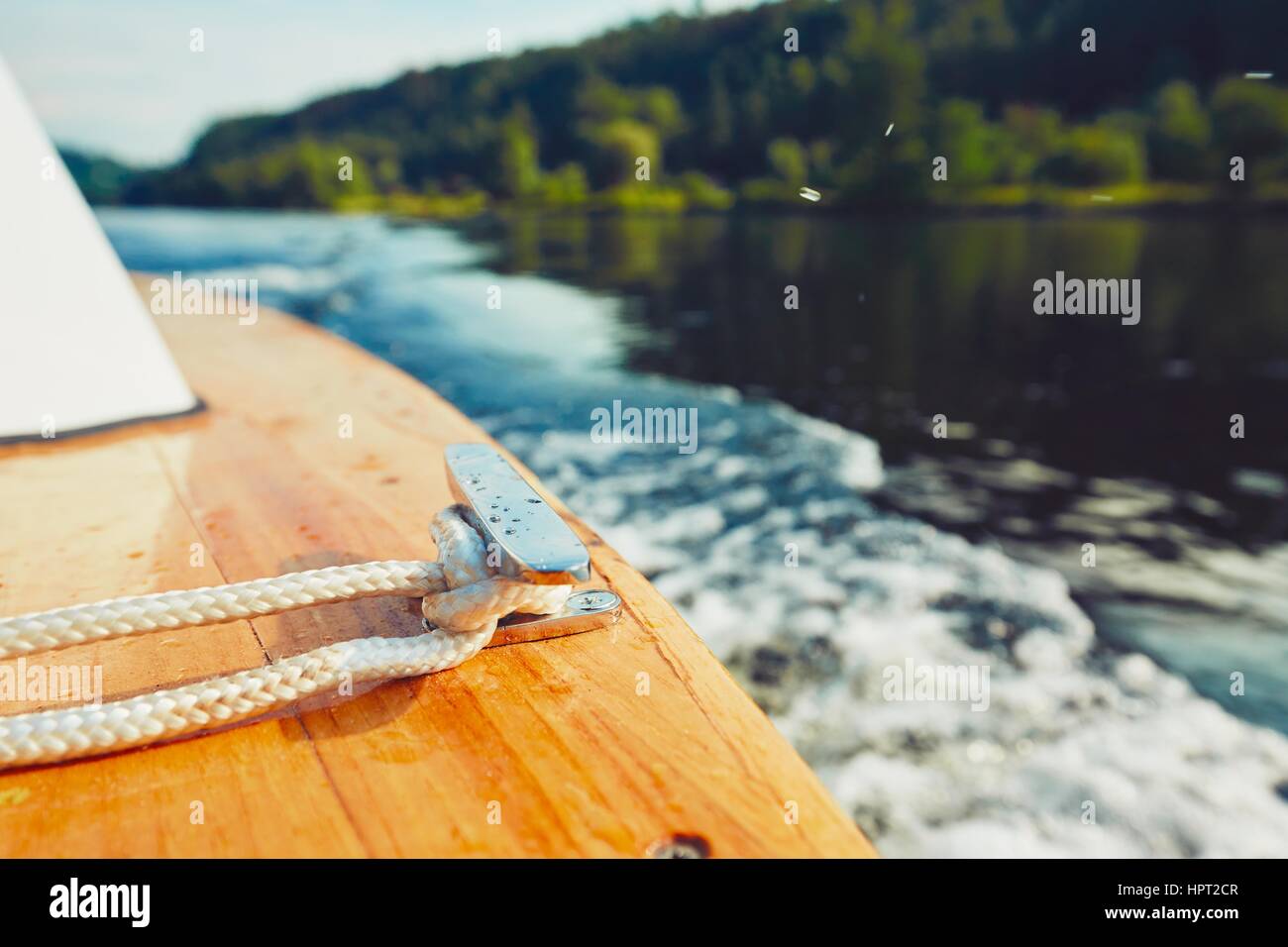 Prow of the floating boat. Close up view of the rope. Stock Photo