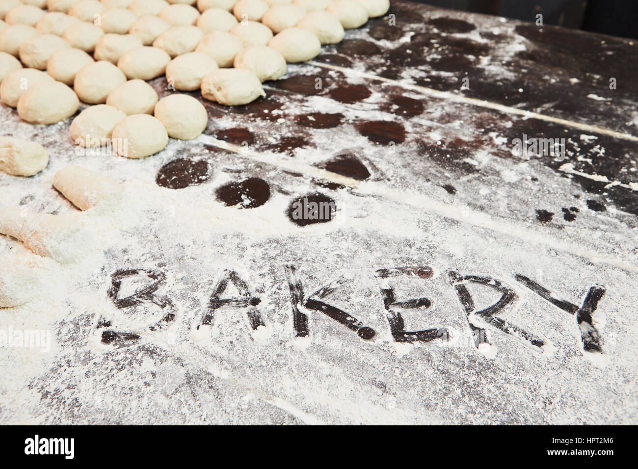 Traditional preparation of bread in the bake shop. Stock Photo