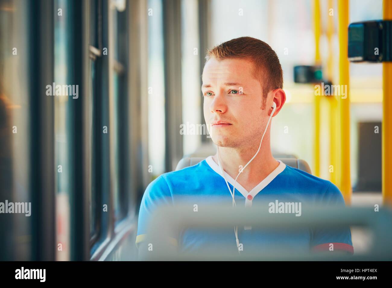 Everyday life and commuting to work by public transportation. Handsome ...