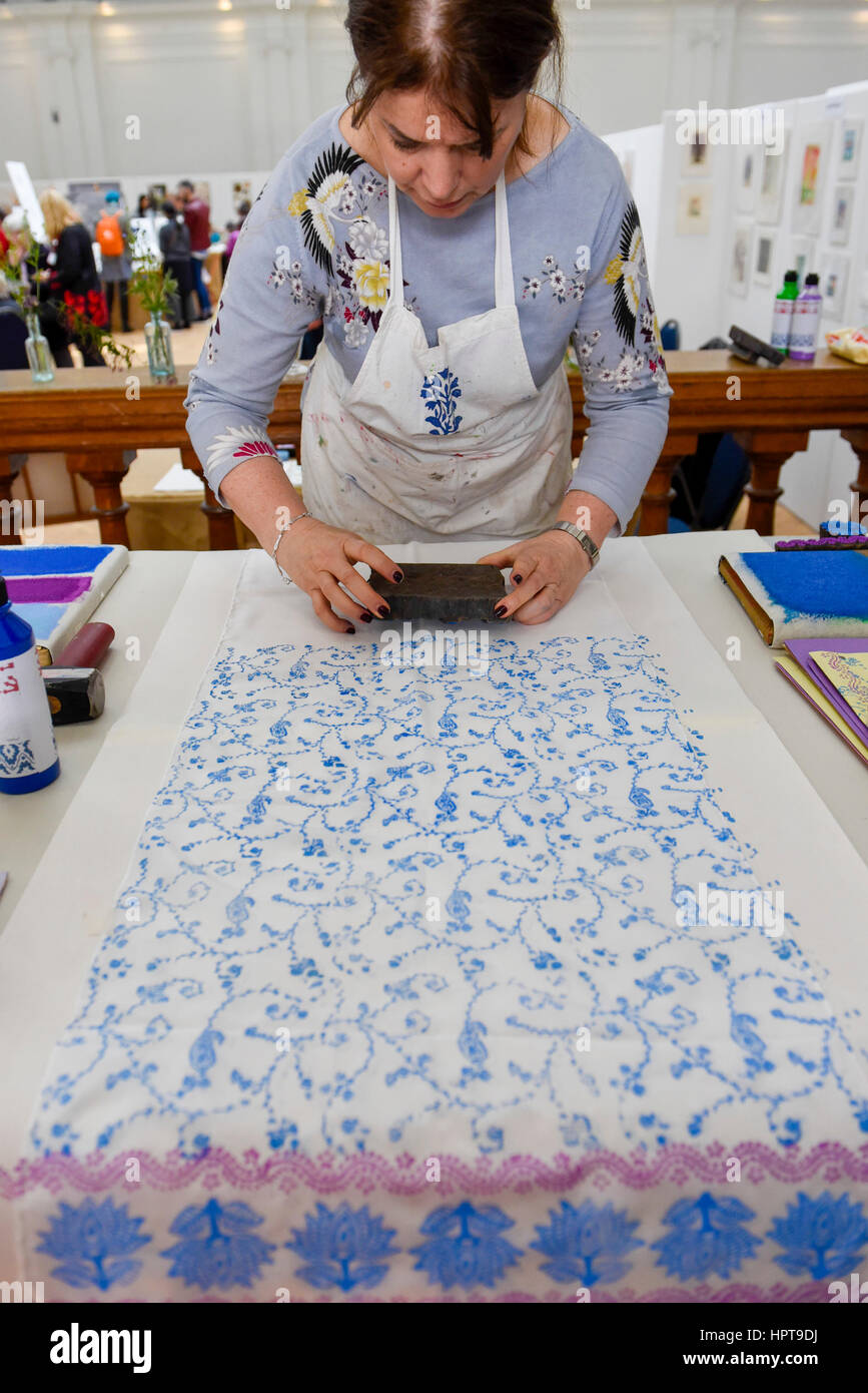 London, UK. 24th Feb, 2017. An artist gives a block printing demonstration as members of the public view the work of some of the world's best botanical artists through a display of previously unseen work at the RHS London Botanical Art Show. Taking place this weekend, the show features artists from the UK and internationally including USA, Italy, Japan, New Zealand and South Korea. Credit: Stephen Chung/Alamy Live News Stock Photo