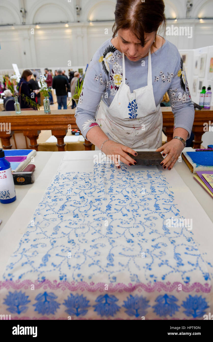London, UK. 24th Feb, 2017. An artist gives a block printing demonstration as members of the public view the work of some of the world's best botanical artists through a display of previously unseen work at the RHS London Botanical Art Show. Taking place this weekend, the show features artists from the UK and internationally including USA, Italy, Japan, New Zealand and South Korea. Credit: Stephen Chung/Alamy Live News Stock Photo