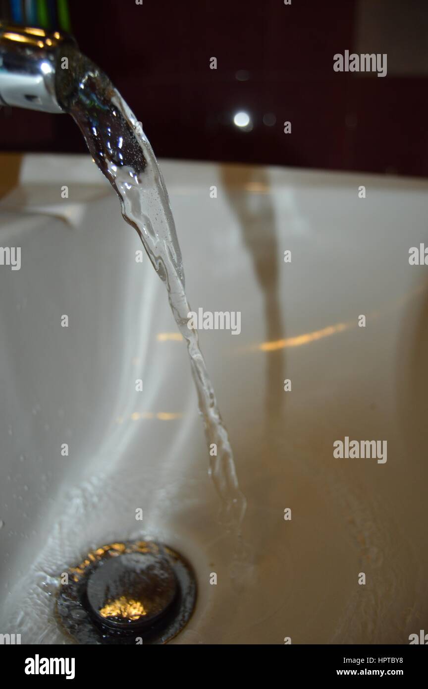 Tap Water Flowing Stock Photo