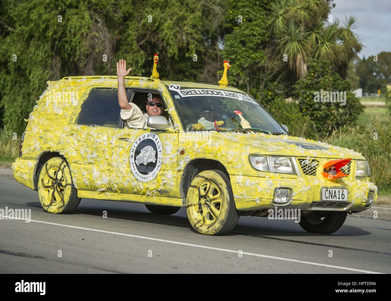 Christchurch, New Zealand. 25th Feb, 2017. Participants check over their cars -- none of which is worth more than NZ$1,700 (about US$1,200) -- then decorate their vehicles, as well as themselves, before driving off for a seven-day ''Shitbox Rally'' around New Zealand's South Island to raise funds for cancer research. Sixty cars, each with a two-person team, are taking part. Decorations for the people and the cars ranged from The Simpsons to ''Braking Bad. Credit: PJ Heller/ZUMA Wire/Alamy Live News Stock Photo