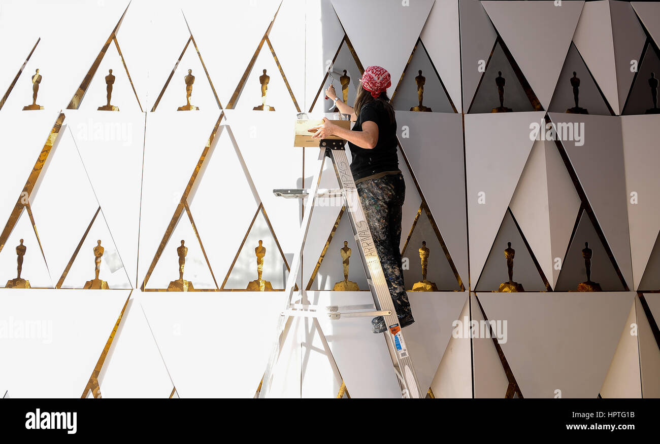 Los Angeles, USA. 24th Feb, 2017. A worker paints an Oscar background plate  during preparation of the 89th Academy Awards at Dolby Theater in  Hollywood, California, the United States, Feb. 24, 2017., image size:1300x876