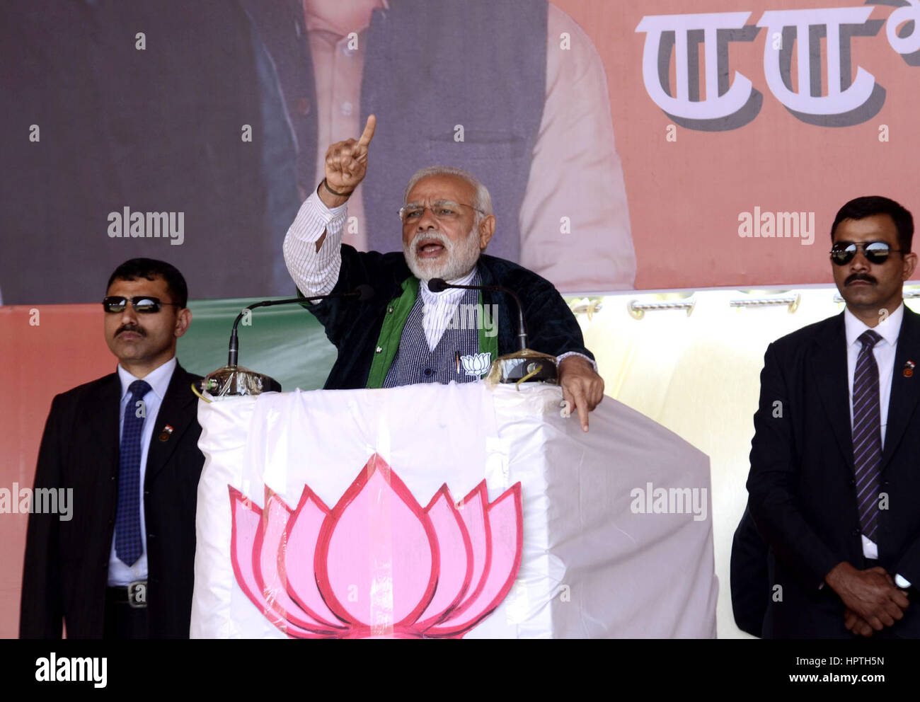 Imphal. 25th Feb, 2017. Indian Prime Minister and ruling Bharatiya Janata Party (BJP) leader Narendra Modi (C) addresses an election campaign rally of BJP at Langjing Achouba Ground in Imphal, capital of India's north eastern state Manipur on Feb 25, 2017. Credit: Stringer/Xinhua/Alamy Live News Stock Photo