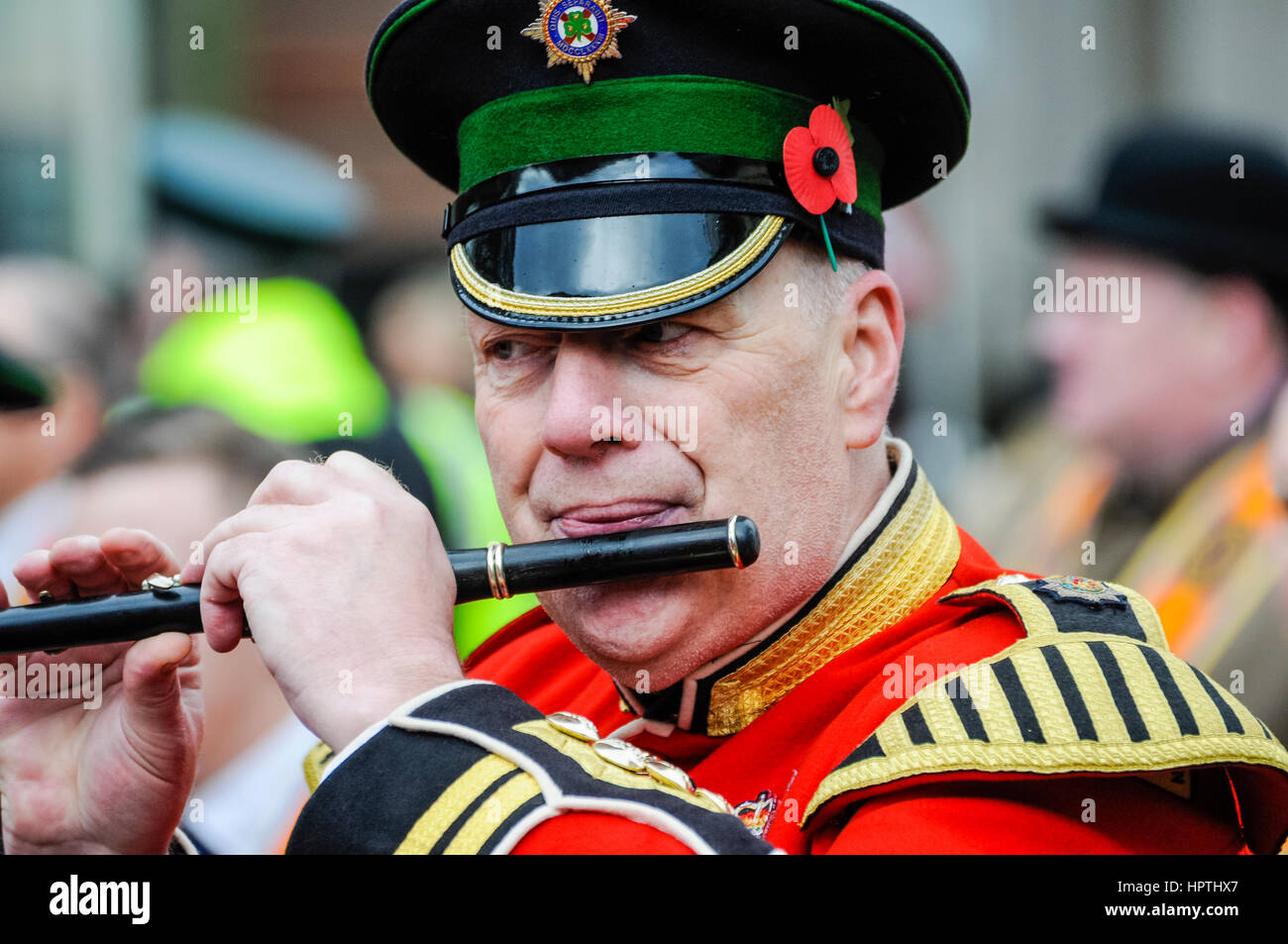 Belfast, Northern Ireland. 25 Feb 2017 Bandsmen play flutes during an Orange Order parade