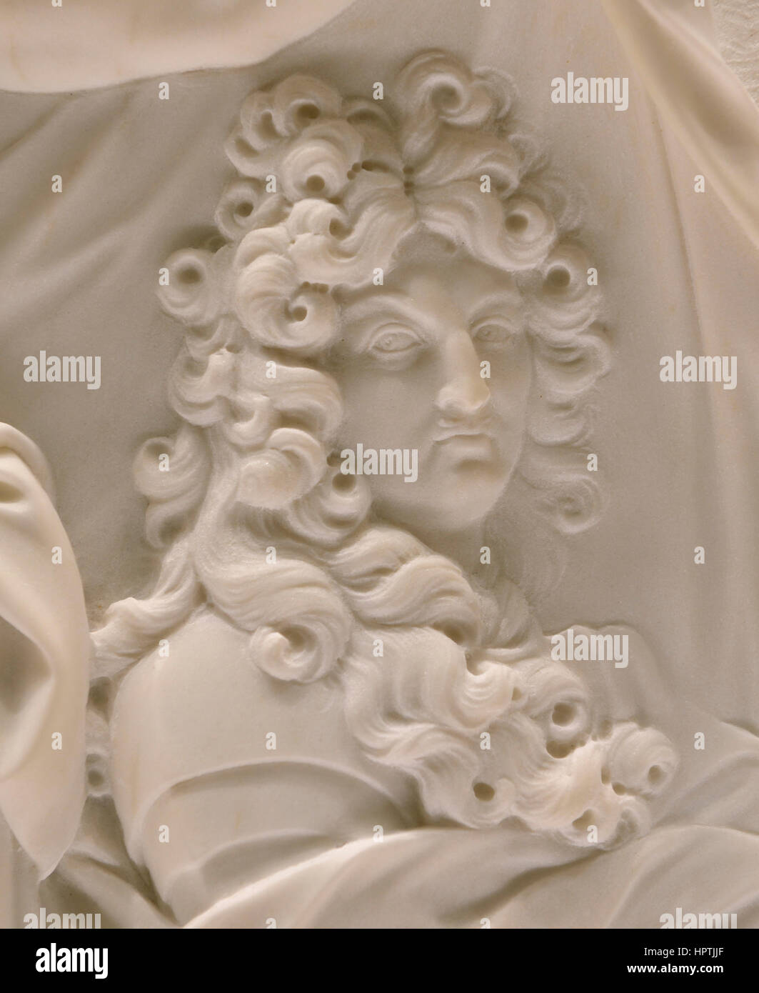 Louis XIV，a part of a marble relief by Nicolas Coustou (1687-1693) in Louvre Museum. Stock Photo