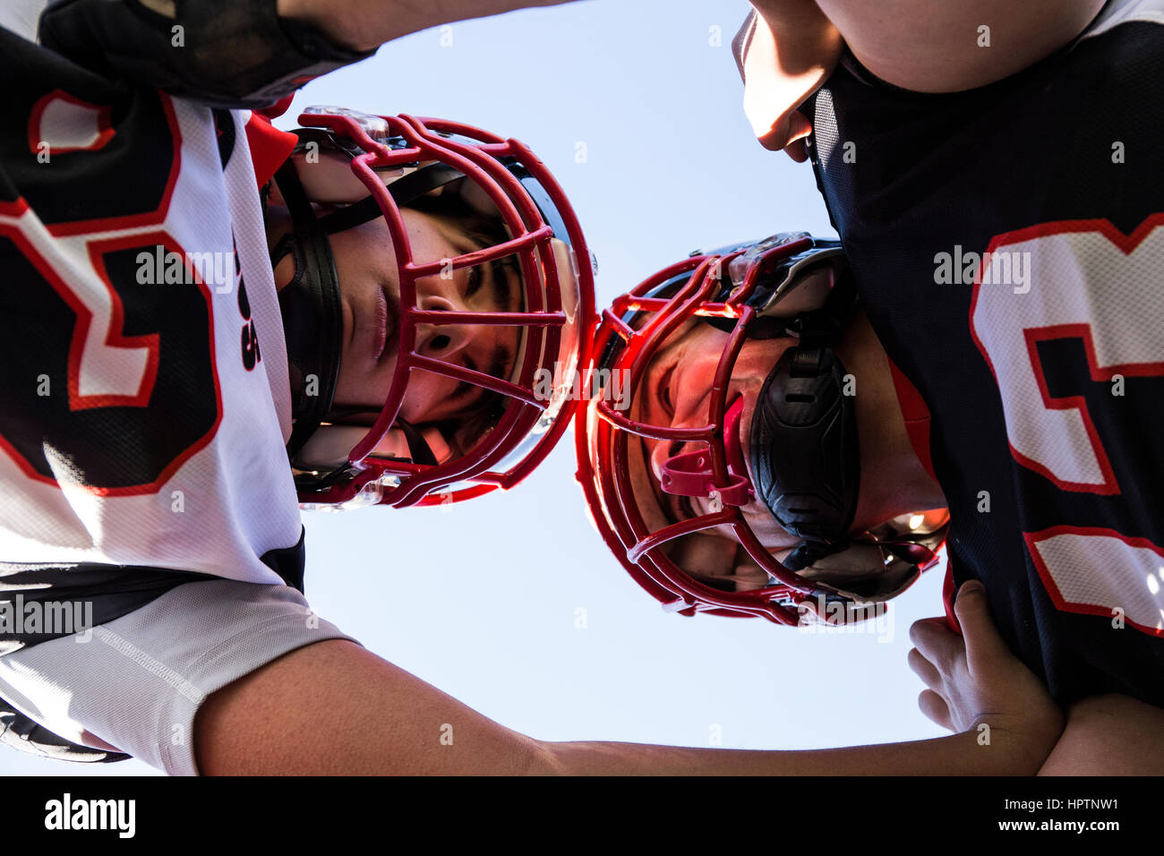 American football players face to face during a match Stock Photo