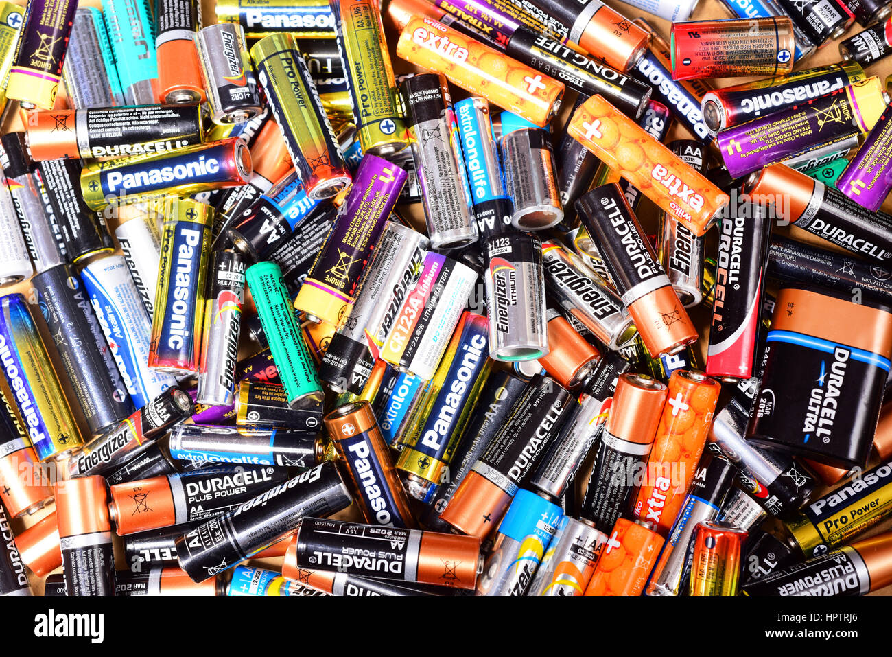 giant pile of old AA and AAA batteries Stock Photo