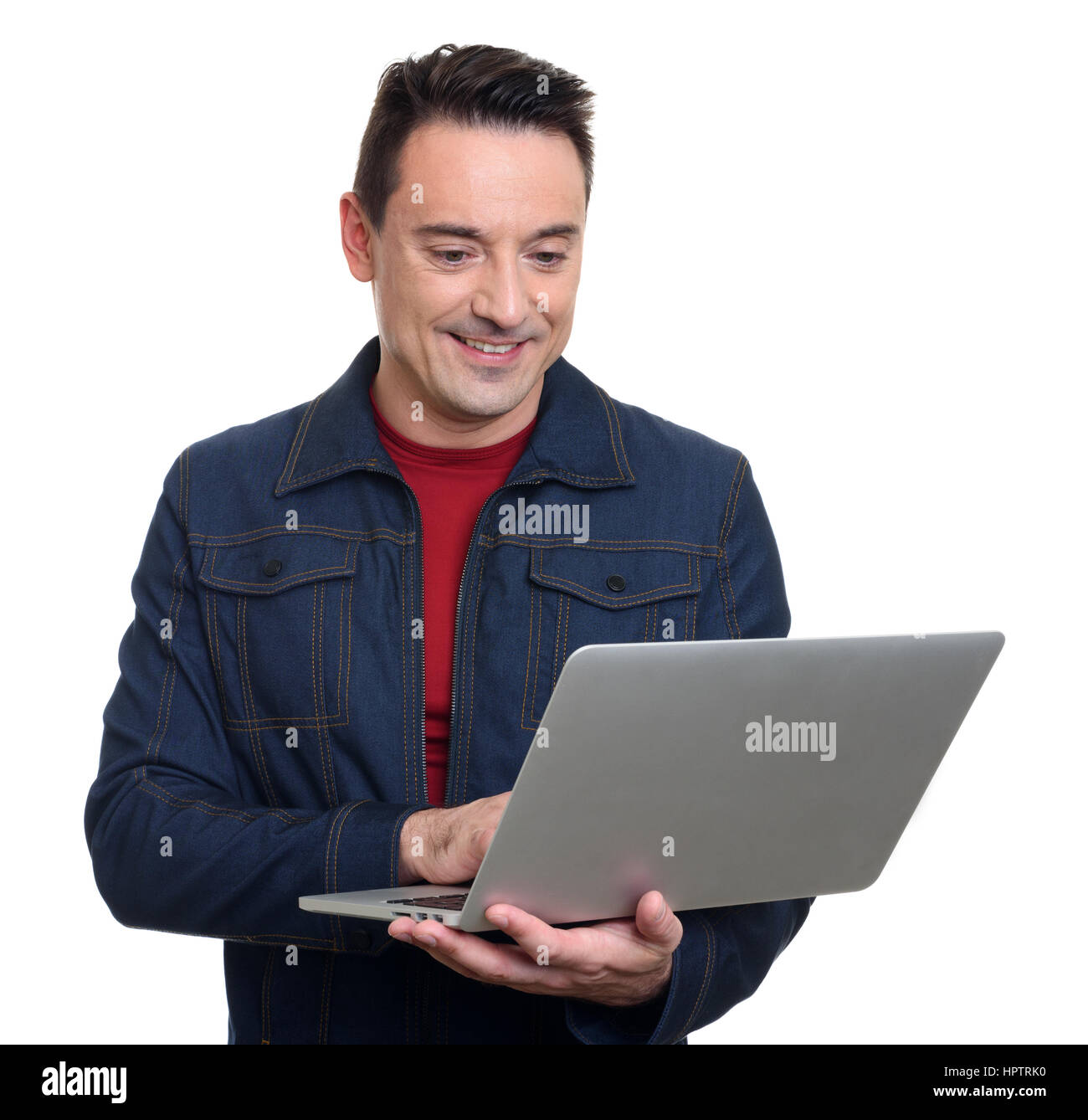 Portrait of smiling young man with laptop isolated over white ...