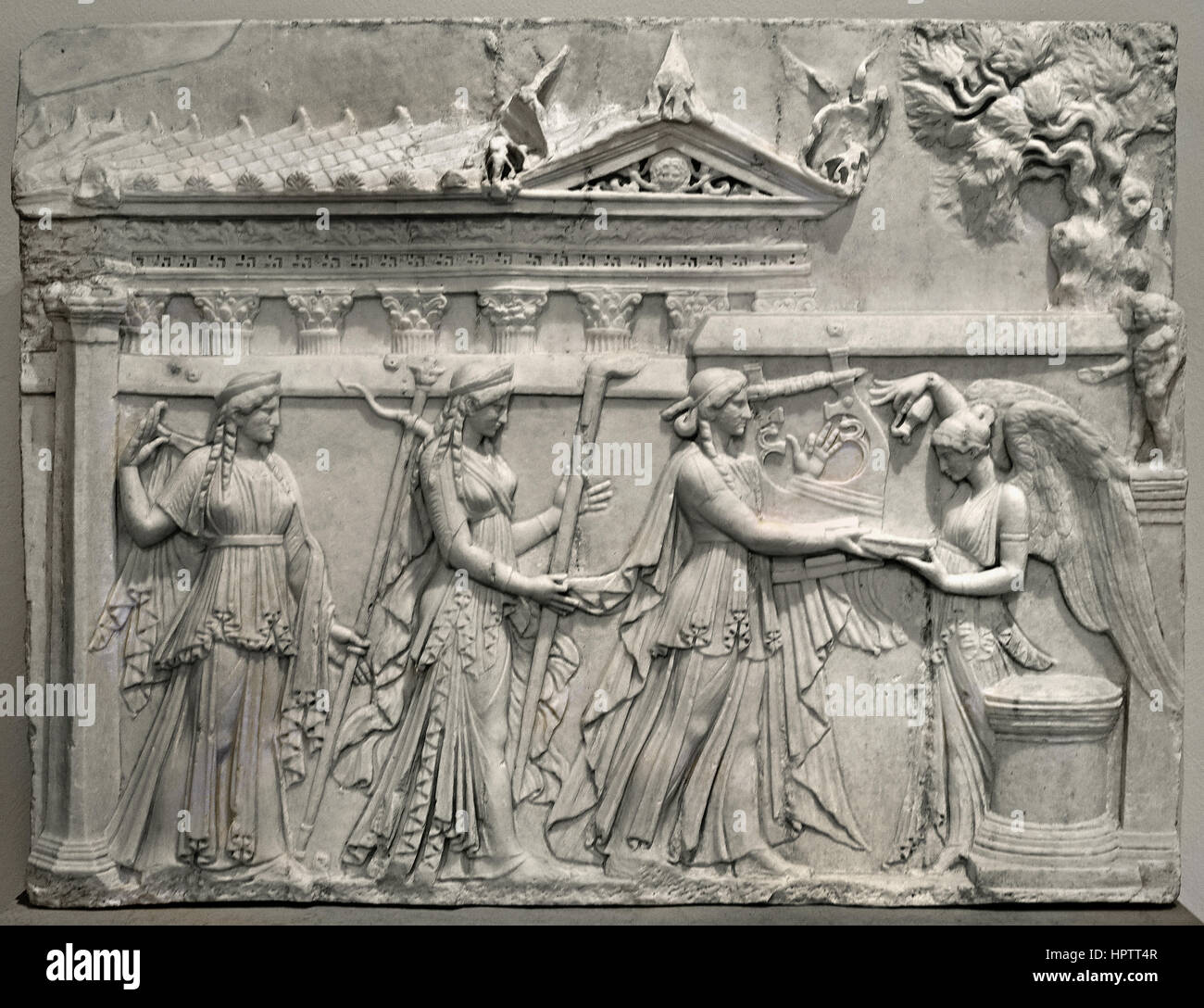 elief with Procession of Gods (Apollo, Diana and Latona) and Sanctuary; 30-20 BC ( Procession of Gods and Sanctuary Depicted is a procession of the gods Apollo, Diana and Latona approaching a round altar in front of which stands Victoria. The offering takes place in a temple sanctuary. ) Stock Photo