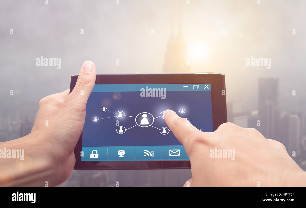 finger touch tablet screen with social network Stock Photo