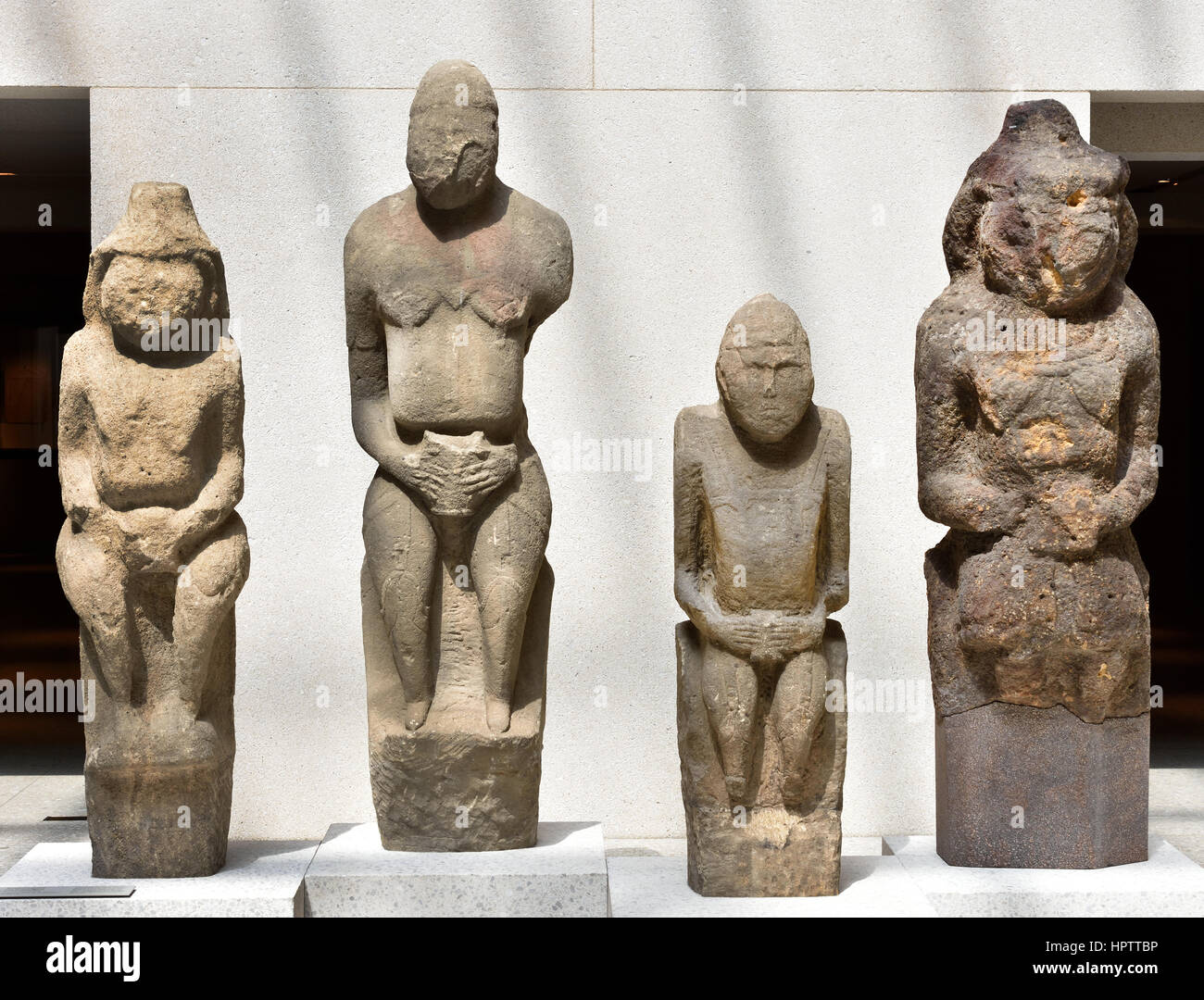 Cuman stone figures of men and women. 12th century AD. The Cumans were a Turkic tribe that ruled the southern Russian steppes from 1055-1240 AD. Stock Photo
