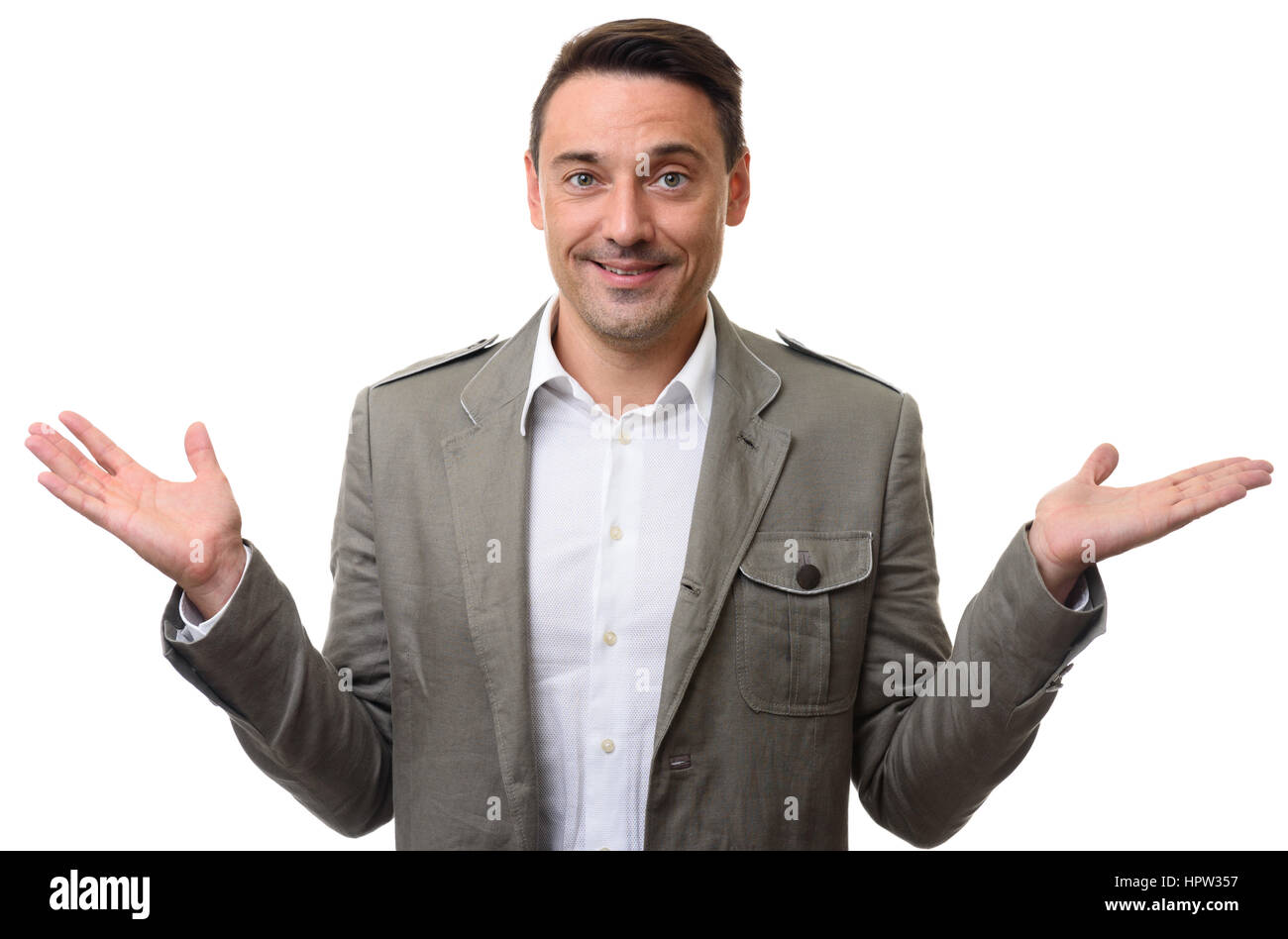 carefree smiling man throwing his hands up. Isolated on white ...