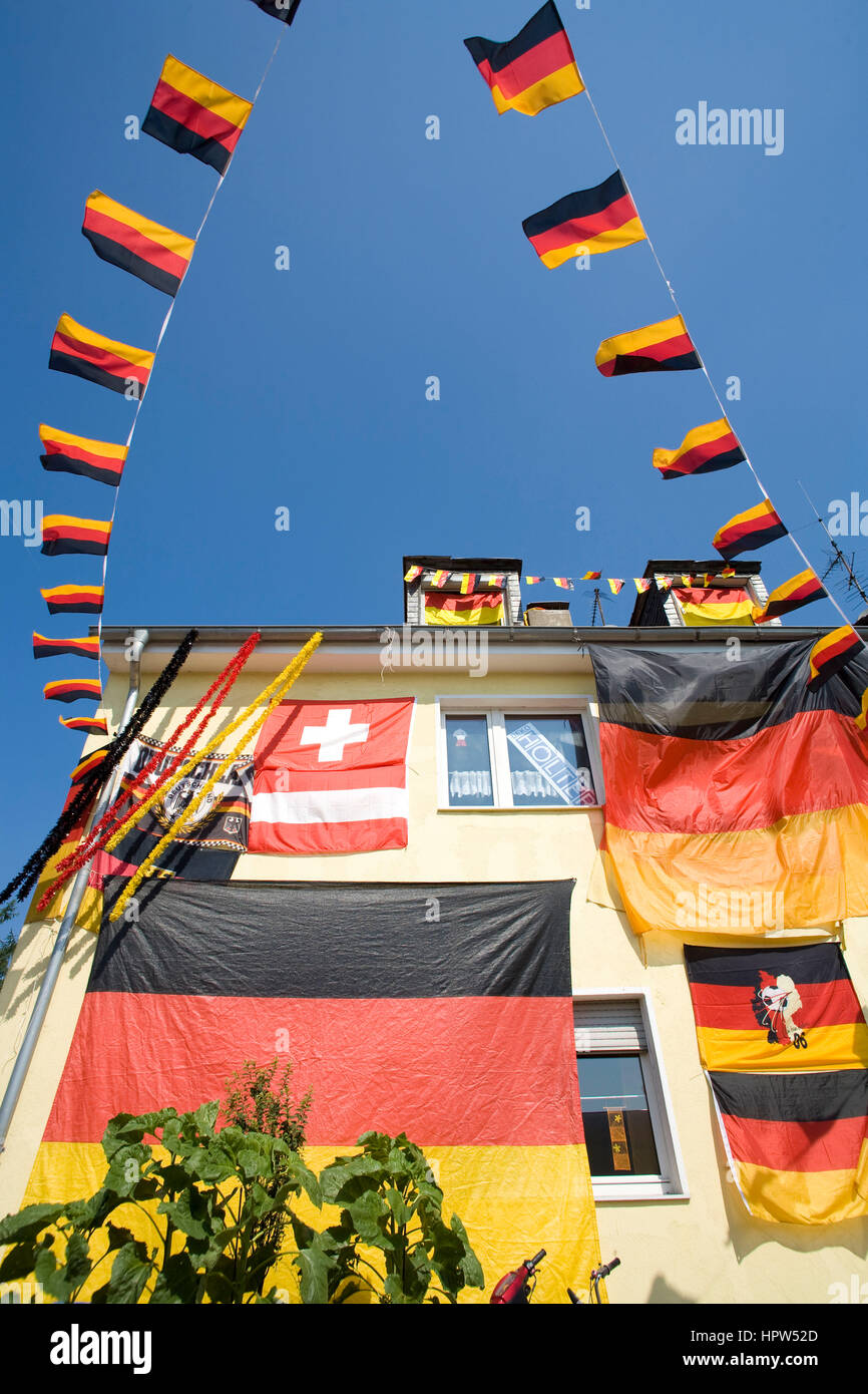 Europe, Germany, Ruhr area, Essen, with German flags decorated house during the UEFA Euro 2008 at the Autobahn A 40. Stock Photo