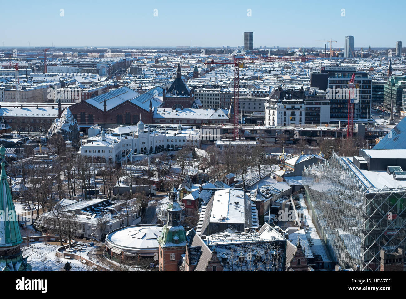 Copenhagen winter cityscape after snow taken from the city hall tower view west over Tivoli and Copenhagen Central Station towards Vesterbro, Stock Photo