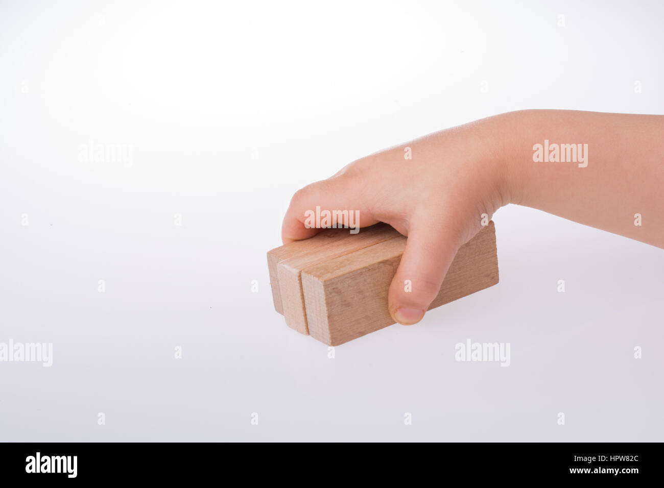 Child playing with building blocks on white background Stock Photo - Alamy