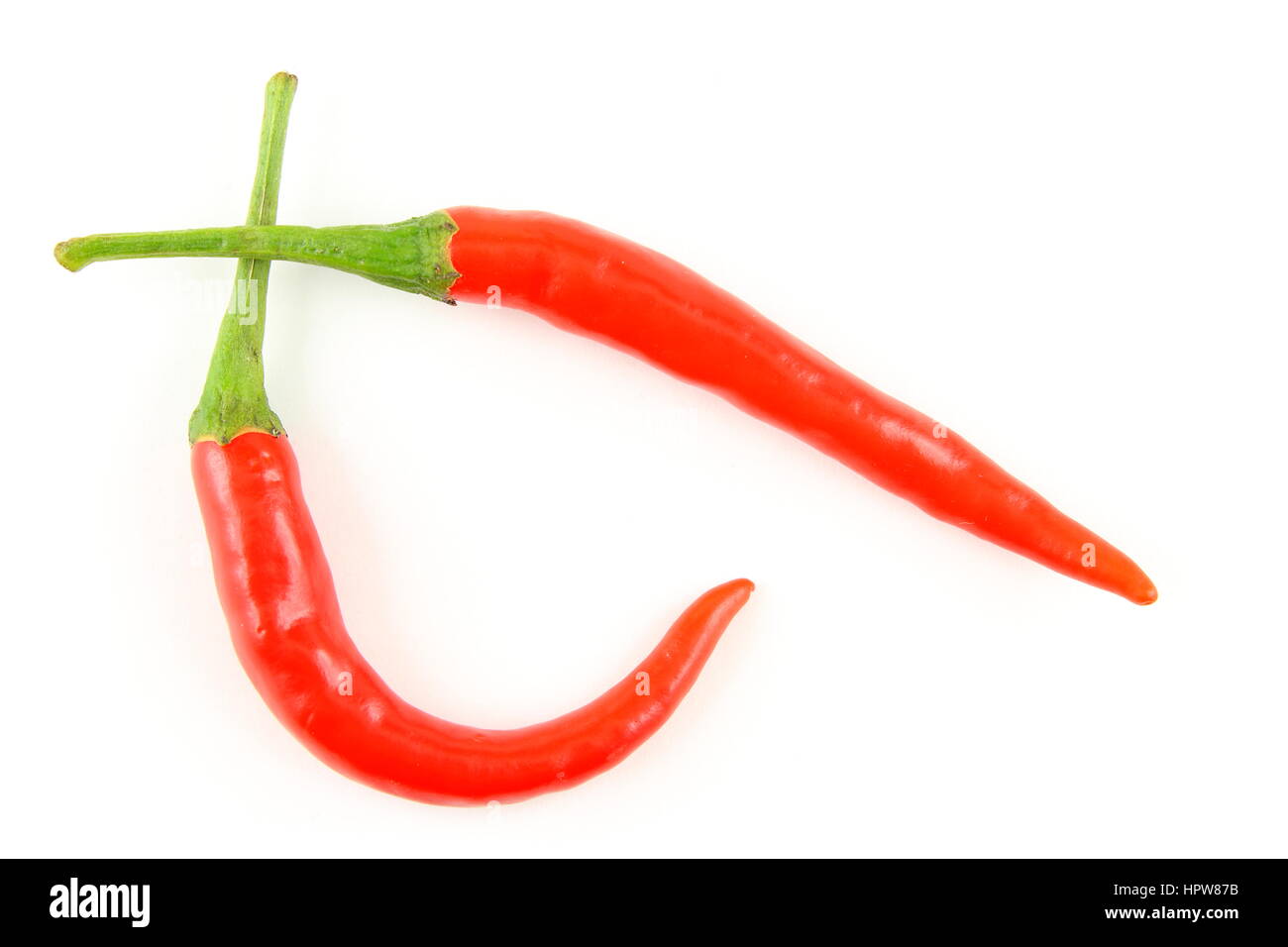 fresh thai chili peppers isolated on a white background as a food background texture Stock Photo
