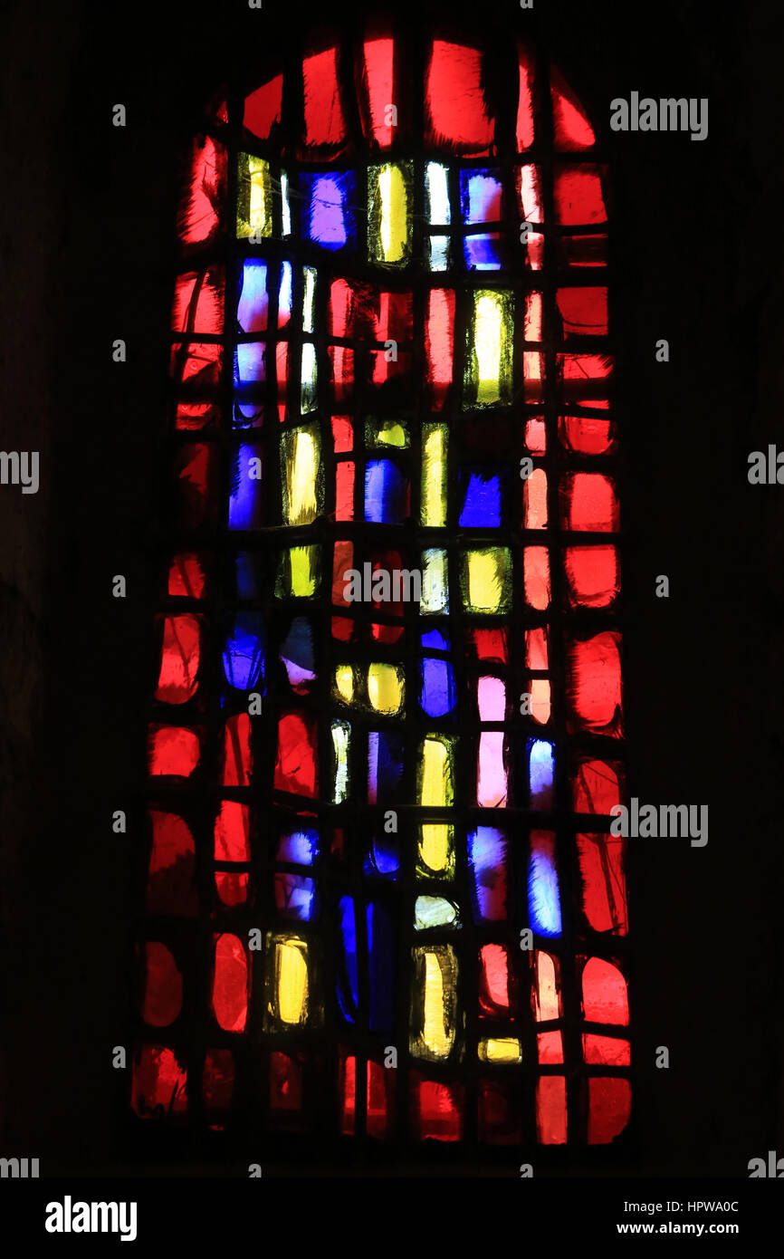 Contemporary stained glass window. Romanesque chapel. Saint-Pierre-et-Saint-Paul Abbey of Wissembourg. / St. Peter and St. Paul's Church, Wissembourg. Stock Photo