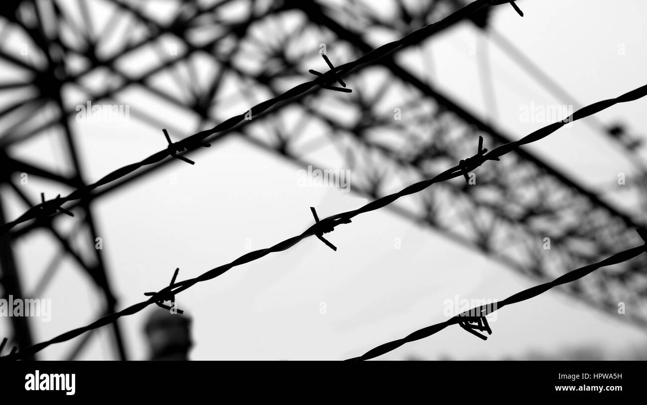 dramatic barbed wire fence with black and white effect Stock Photo - Alamy